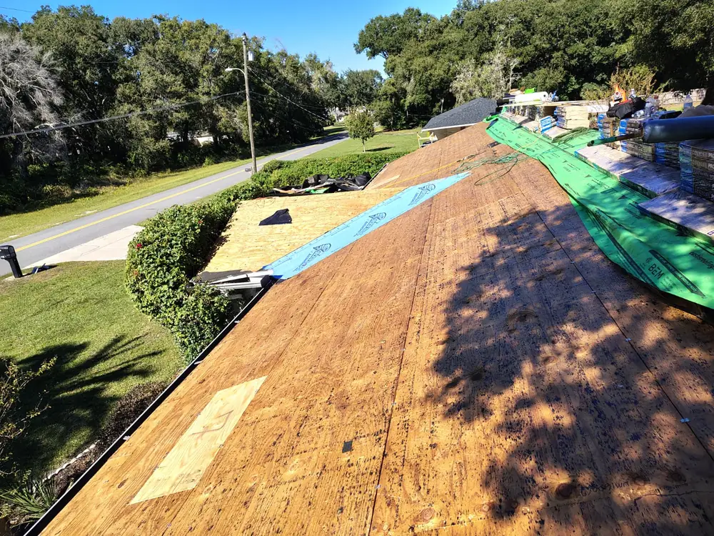 Roof deck with new underlayment during a replacement