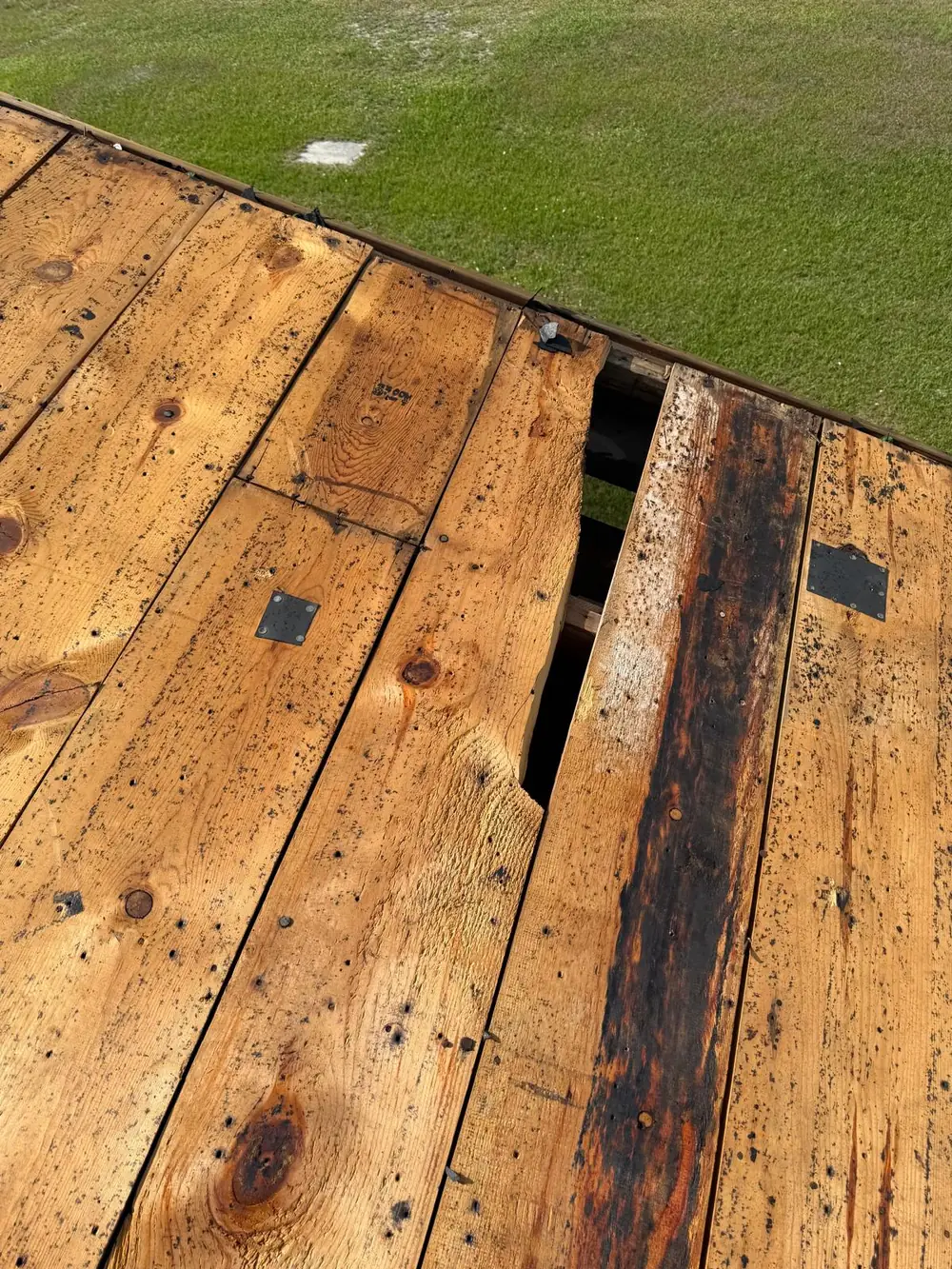 Logams Roofing crew replacing a shingle roof on a Central Florida home