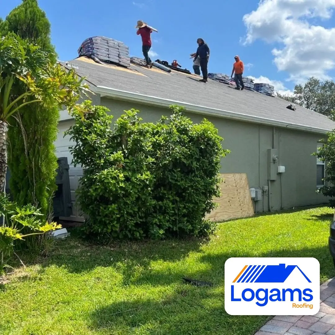 Logams Roofing crew replacing a shingle roof on a Central Florida home